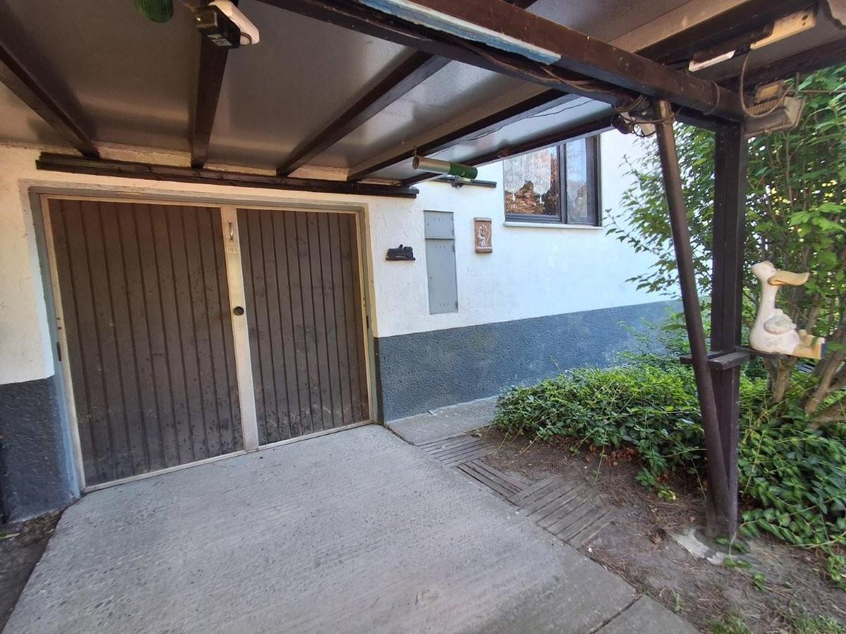 30 Garage mit Carport 1220