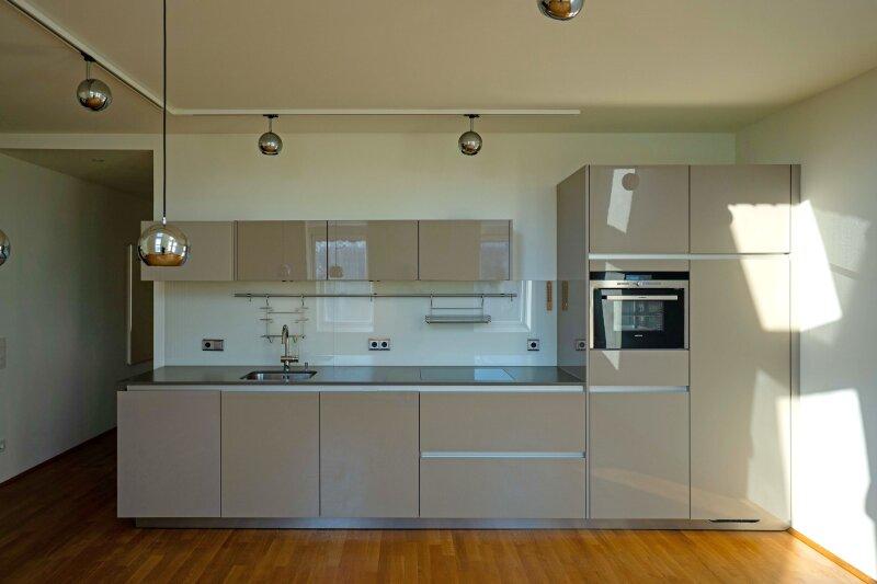 SieMatic Küche mit Hochglanzfronten und Siemens Einbaugeräte