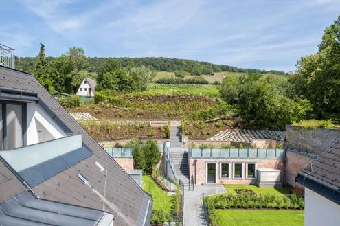 Großzügige Terrassenwohnung nähe AIS - ERSTBEZUG