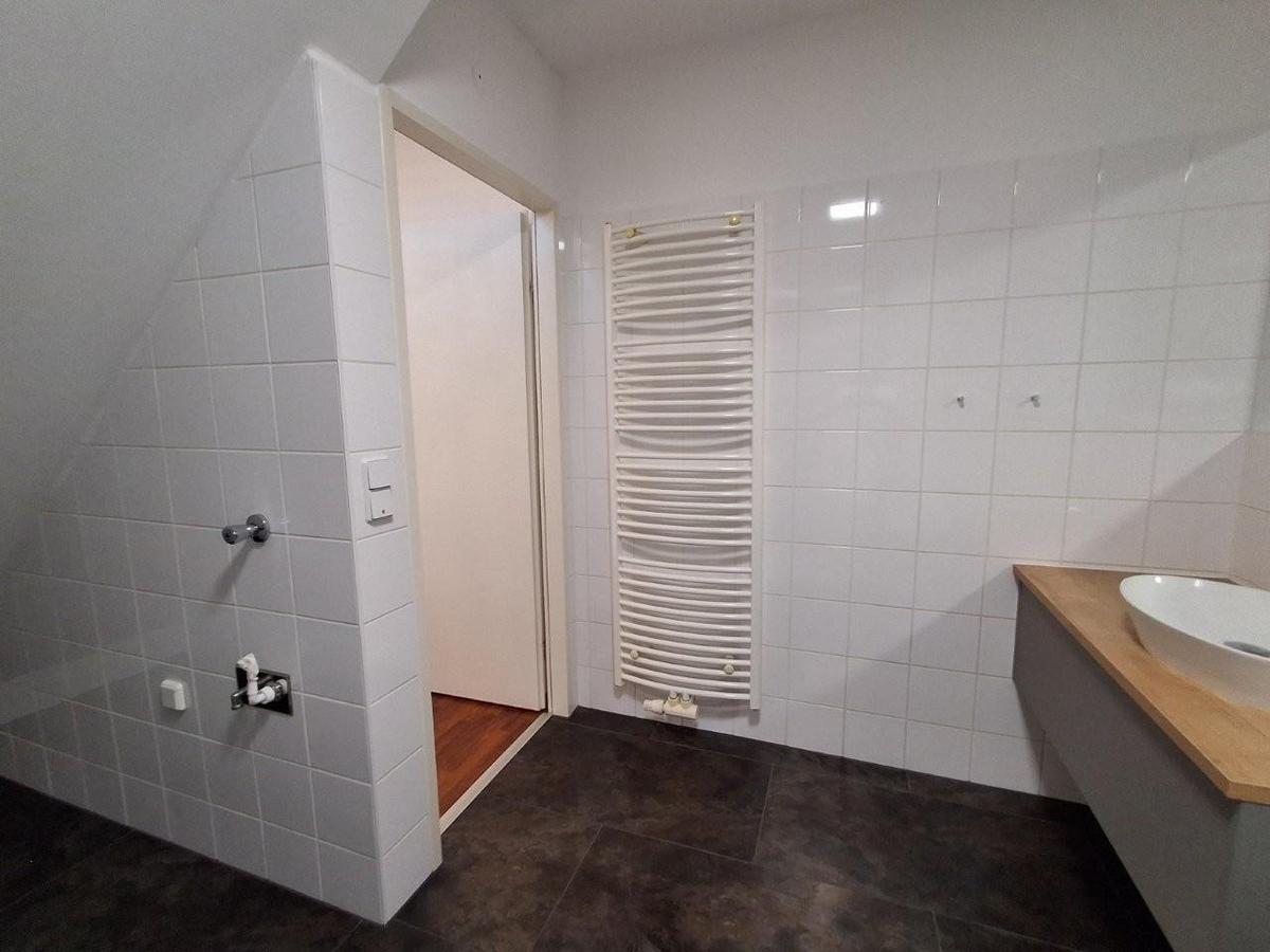 25 Waschmaschinenanschluss im Bad 1210