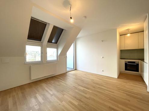 Klimatisierte DG-Wohnung mit hofseitigem Balkon! Baujahr 2021!