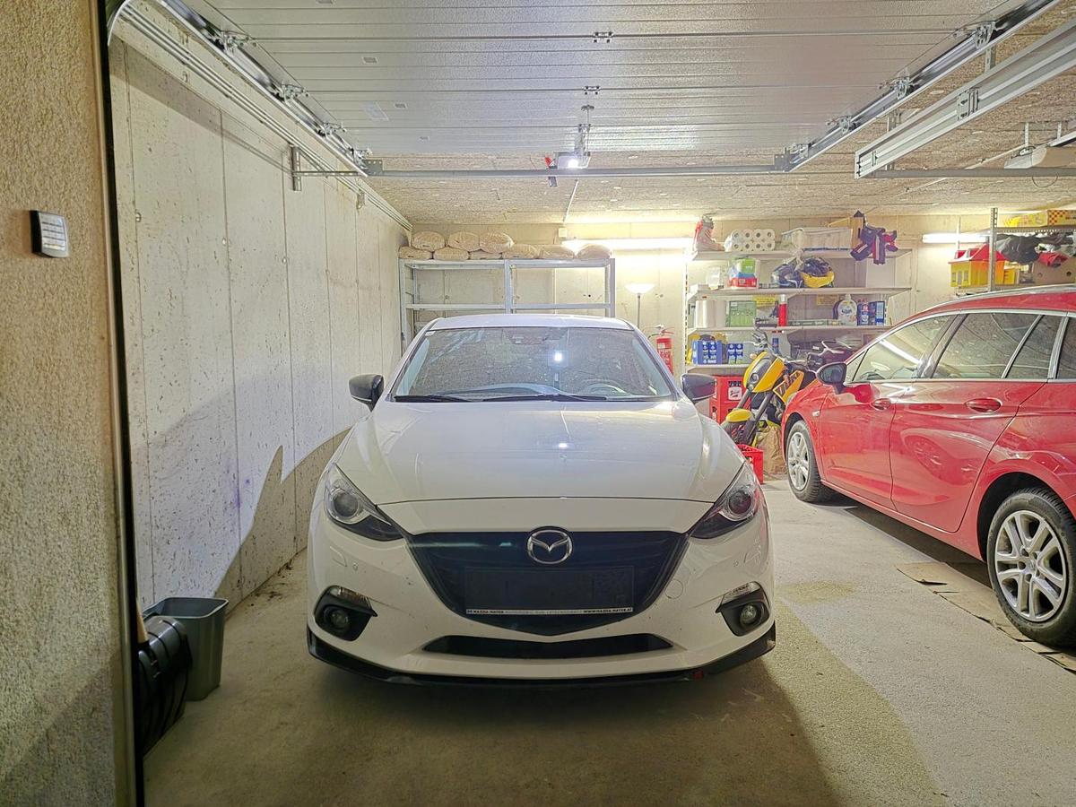 Einzelgarage + Abstellplatz davor