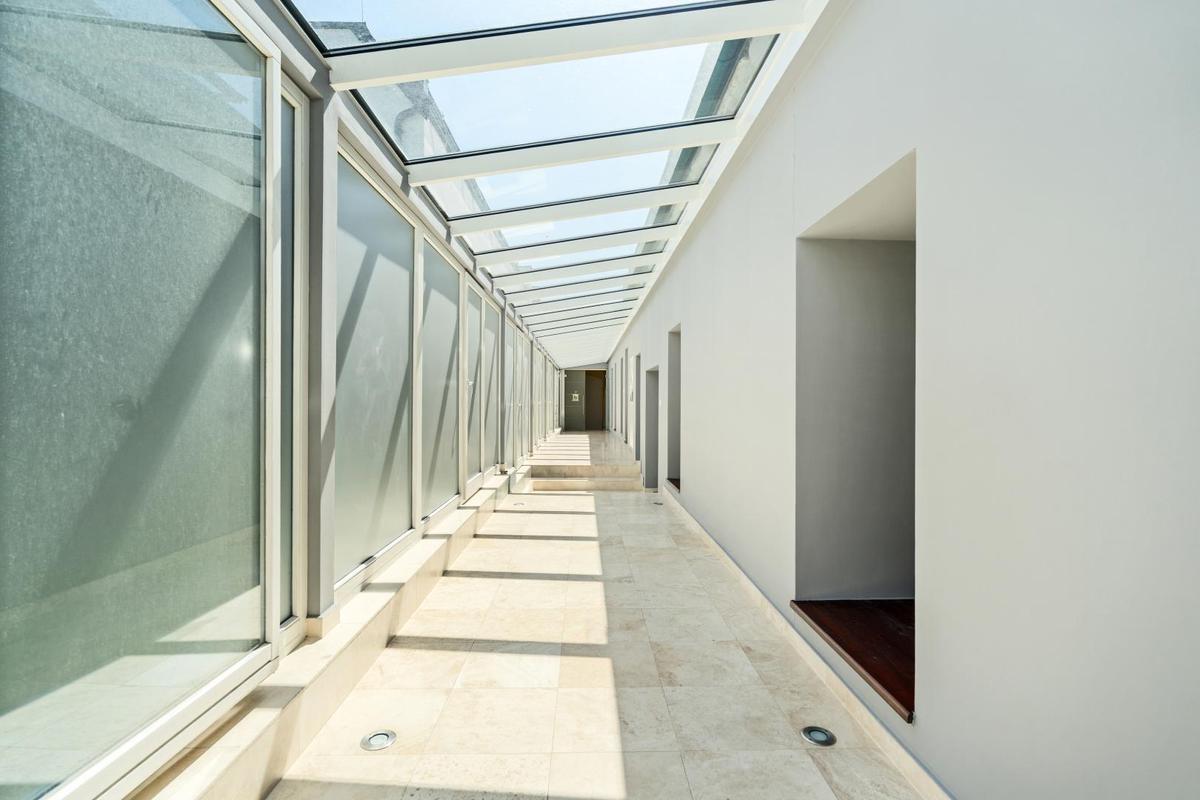 18 Wintergarten von Gartenseite Richtung Str