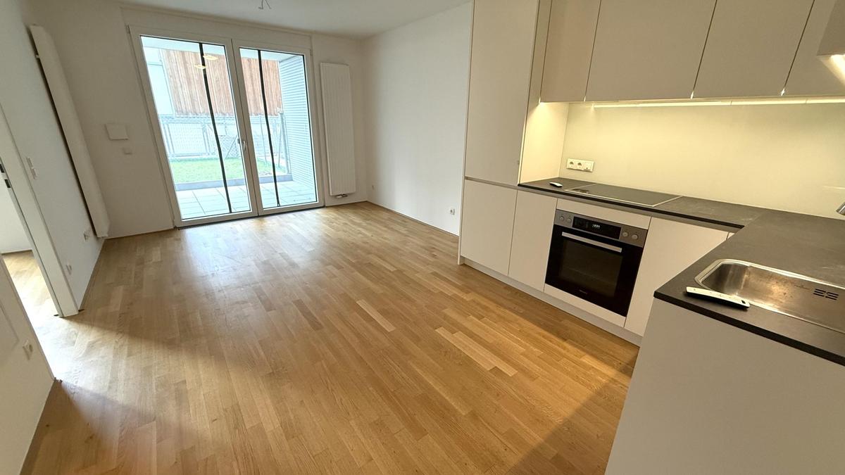 Wohnzimmer mit offener K�che