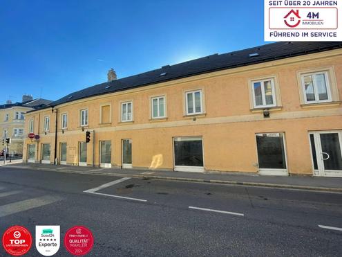 Mehrfamilienhaus mit Gesch�ftslokal und beh. genehmigter Aufstockung