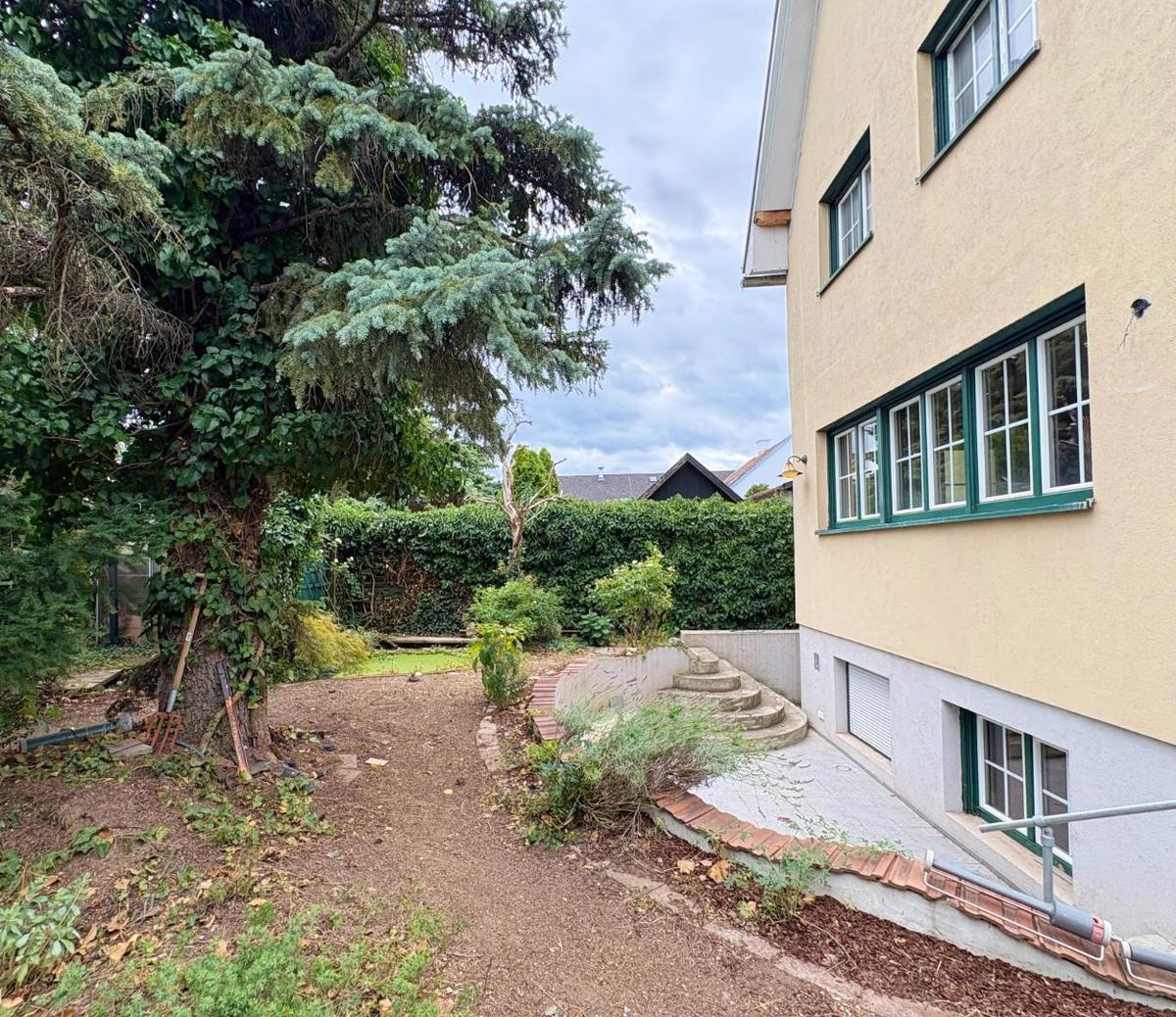 03. Haus Gartenansicht Terrasse