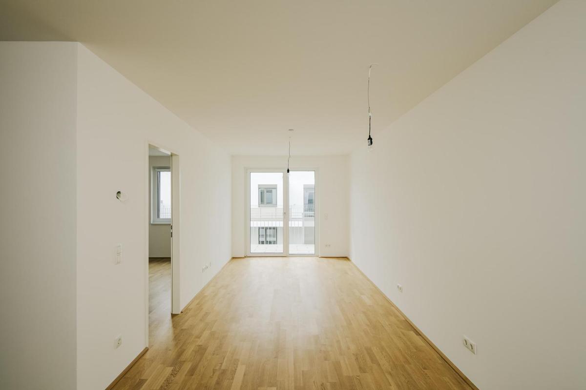 Schlafzimmer einer identen Wohnung im Haus