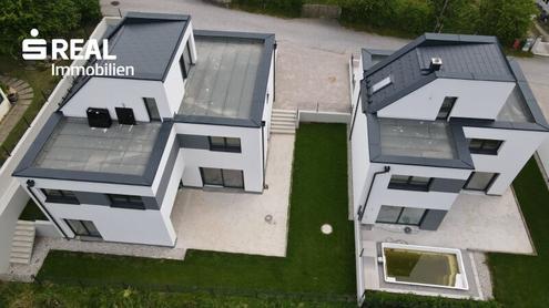 Neubau - Wohnung mit groer Terrasse und Garten