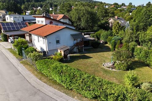 Perfekter Familienwohnsitz in sonniger Siedlungslage mit herrlichem Südgarten