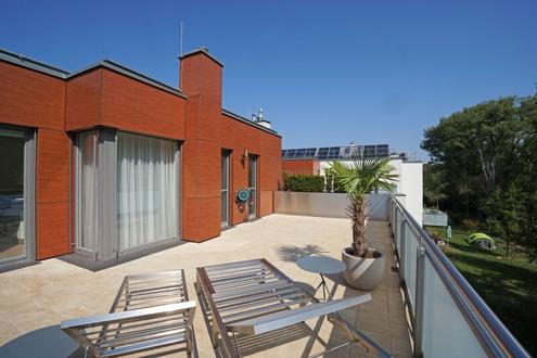 Stilvolle Wohnoase: Penthouse-Wohnung mit über 100 m² Dachterrasse