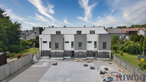 Neubau in Ruhelage! Schlüsselfertiges Reihenhaus mit 113m² Wohnnutzfläche, 5 Zimmern und Eigengarten! Heizen mittels Luftwärmepumpe!