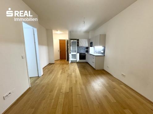 moderne 2 Zimmer - Neubauwohnung mit großem Balkon und KFZ Stellplatz