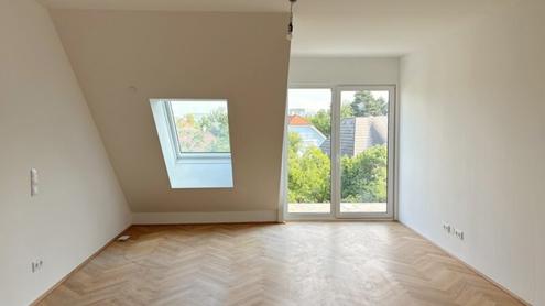 Moderne Architektur inmitten der Natur - Hochwertige Dachgeschoss 2-Zimmer Wohnung mit Balkon!