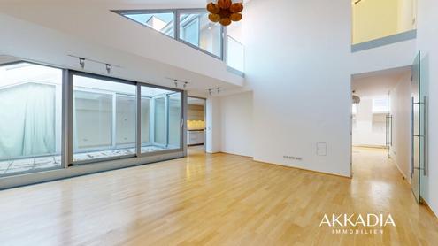 Dachgeschosswohnung in historischem Palais und exklusiver Lage mit Blick über die Karlskirche und Wien