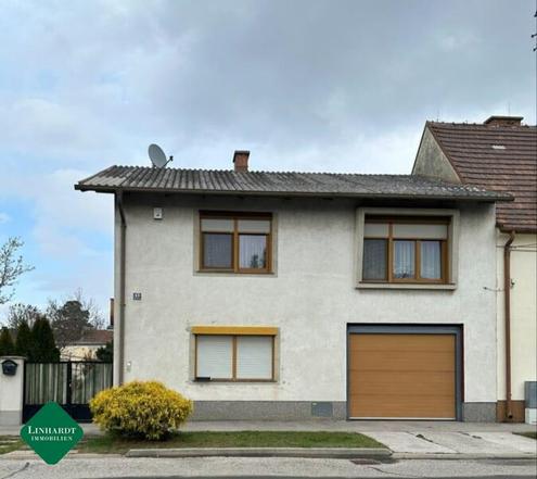 Haus mit großem Garten und Garage