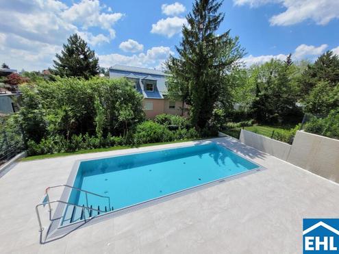 3-Zimmerwohnung mit Pool & Eigengarten!