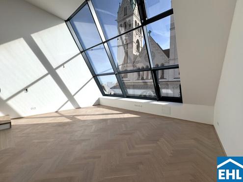 Spektakuläre Dachgeschoßmaisonette mit Terrassentraum und Blick auf die Canisiuskirche
