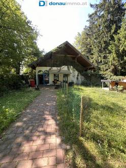 Gartenparadies mit idyllischem, finnischem Holzhaus wird zum Kauf angeboten - Perfekt fr Familien und Ruhesuchende!