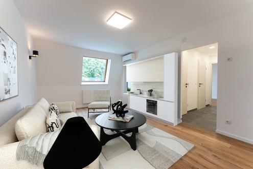 Erstbezug! Stylische Dachgeschoßwohnung mit Loggia & Klimaanlage - Innenhof Grünblick