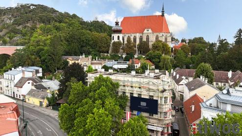 IMPOSANTE ALTBAUWOHNUNG MIT BALKON UND TRAUMBLICK AUF DIE KIRCHE II PRESTIGE UND ELEGANZ II WOHNEN IM DENKMALGESCHTZEN MDLINGER STADTJUWEL II FUSSGNGERZONE