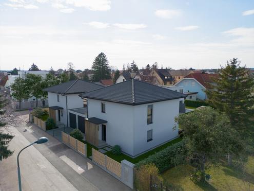 Eckgrundstck mit Einfamilienhaus - Belagsfertig oder schlsselfertig