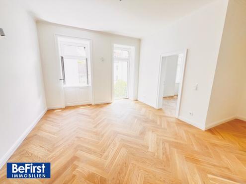 Prachtvoll sanierte Balkonwohnung - ruhige Hofgartenlage
