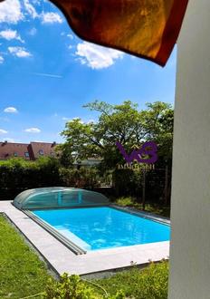 Grozgiges Einfamilienhaus mit Garage und Swimmingpool in einer begehrten Lage von Hagenbrunn!