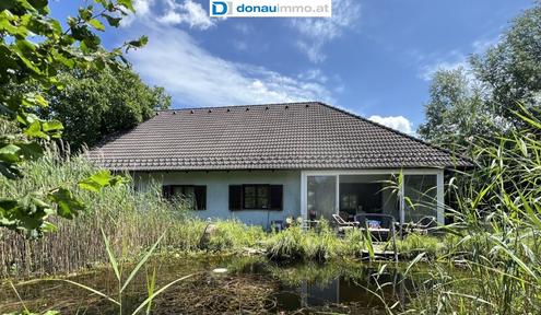 1220 Wien - Grozgiger Bungalow mit Wintergarten und zwei Wohneinheiten auf Grundstck mit 1.486 m und 2 Wohnhusern