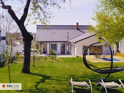 Top-ausgestattetes Wohnhaus mit gepflegtem Garten