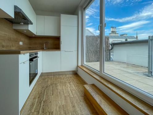DG-Maisonette mit Terrasse - Wohnen auf zwei Ebenen in ruhiger Stadtlage mit Weitblick