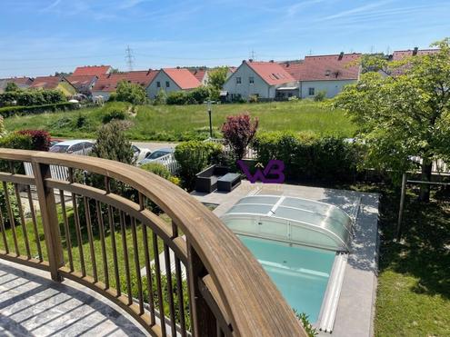 Grozgiges Einfamilienhaus mit Garage und Swimmingpool in einer begehrten Lage von Hagenbrunn!