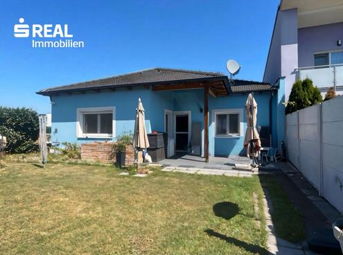 Moderner Bungalow mit Garten und Garage