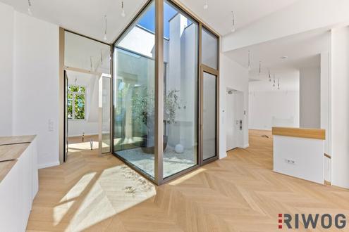 3,7m Raumhöhe im DG, Garage mit 2 Stellplätze, Atrium, Aufzug in die Wohnung und 360° Dachterrasse