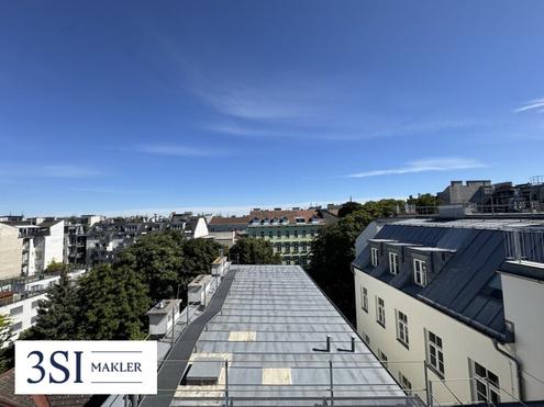 Traumblick! Urbanes Wohnen- 1,5-Zimmer-Juwel im 7. Bezirk mit riesiger Dachterrasse
