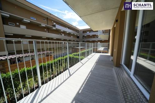 ATTRAKTIVE 2-Zimmer-Wohnung mit sonnigem Balkon, edler Tischlerküche und Tiefgaragenplatz - Erstbezug in bester Lage!