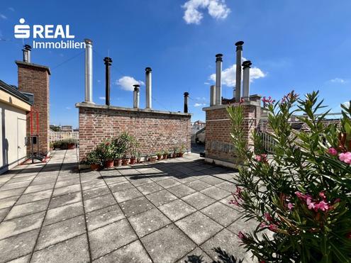 City-Living mit Komfort: großzügige Wohnung mit Dachterrassenzugang