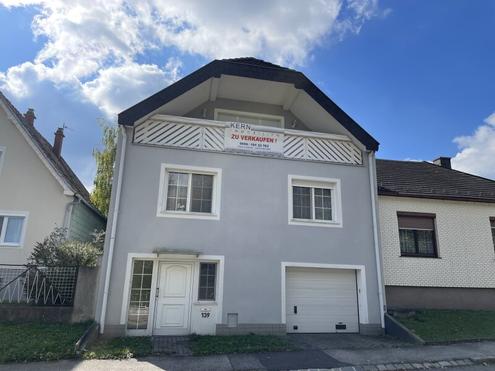 SEHR GEPFLEGTES EINFAMILIEN-HAUS MIT SCHNEM GARTEN -- LOGGIA/GARAGE -- RUHELAGE!