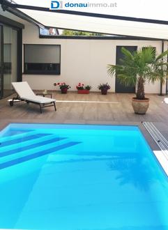 Neuwertiger Massivbungalow mit Pool, Gstehaus, Keller, Wintergarten in Guntramsdorf - Preis auf Anfrage