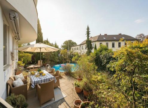 Wohnglück mit Garten & Pool - Charmante 5-Zimmer Wohnung in Ruhelage