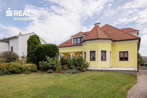 Traumhaus in Göllersdorf: Gepflegte 8 Zimmer-Oase mit großem Garten und Garage!