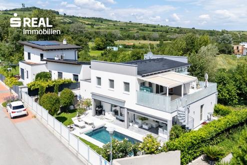 Luxusimmobilie am Fue der Weinberge in Guntramsdorf - Pool, Sauna, Doppelgarage und wunderschn angelegtem Garten - alles hochwertig!