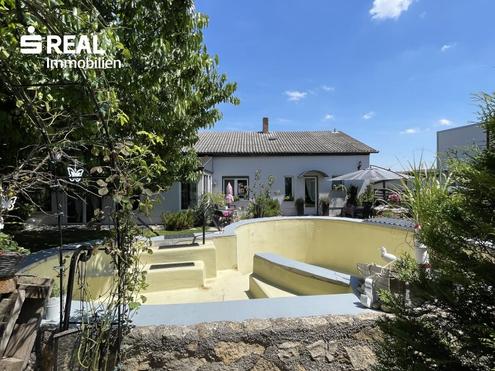 Viel Raum zum Leben - flexibel nutzbares Wohnimmobilie mit Gartenhaus, Pool und Garage in Kittsee