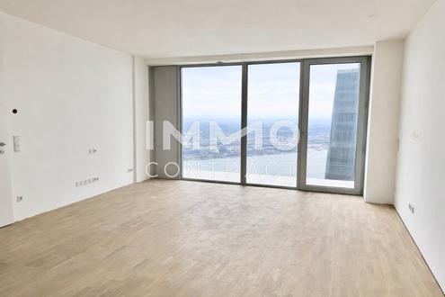 2-Zimmer-Panoramawohnung im 48. Stock mit Abendsonne und Weitblick bis Kahlenberg und Leopoldsberg