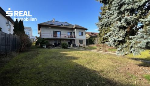 Wohnen im Grünen: Einfamilienhaus mit traumhaften Garten in Oberlaa (mit Bieterverfahren)