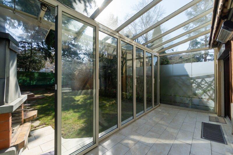 Wintergarten mit Gartenzugang