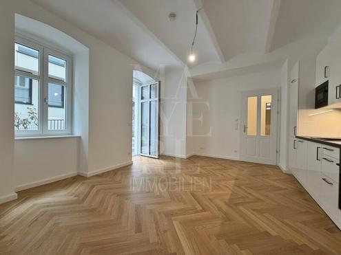 Komplett sanierte Altbauwohnung mit Garten/Terrasse und Naturpool - ERSTBEZUG