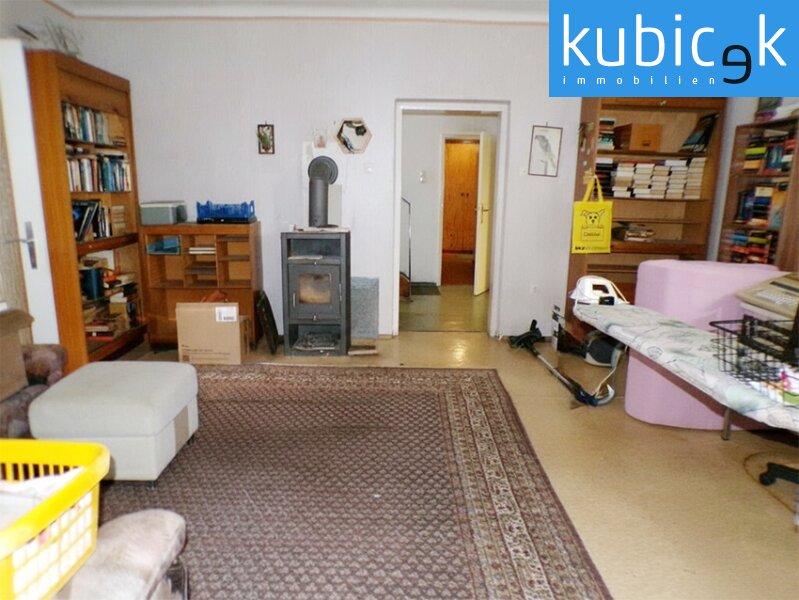 Linke H�lfte EG: Wohnzimmer mit Kamin