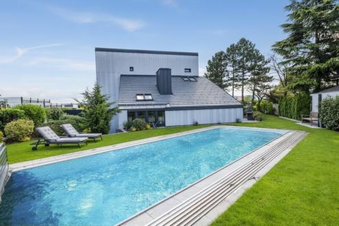 Au�ergew�hnliches Designerhaus mit viel Raum zur Entfaltung | 8 Zimmer, Edelstahlpool, Sauna, Weinkeller | Vereint Wohnen und Arbeiten | Barrierefrei
