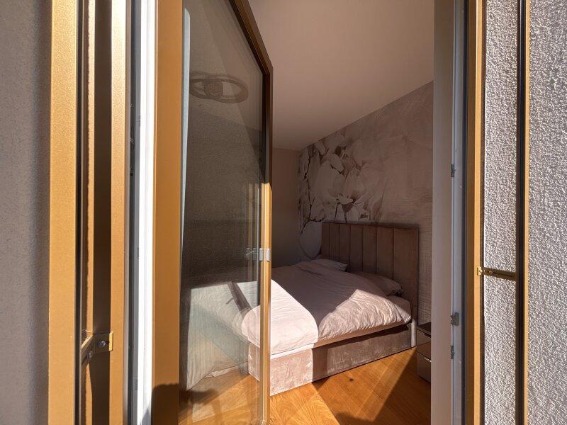 Schlafzimmer mit Balkon