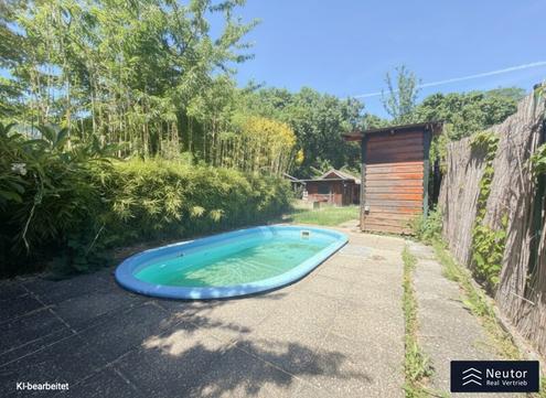 SOMMER - FERIENHAUS IN KLEINGARTENSIEDLUNG  - MITTEN IM PRATER - GR�NRUHELAGE - SWIMMINGPOOL